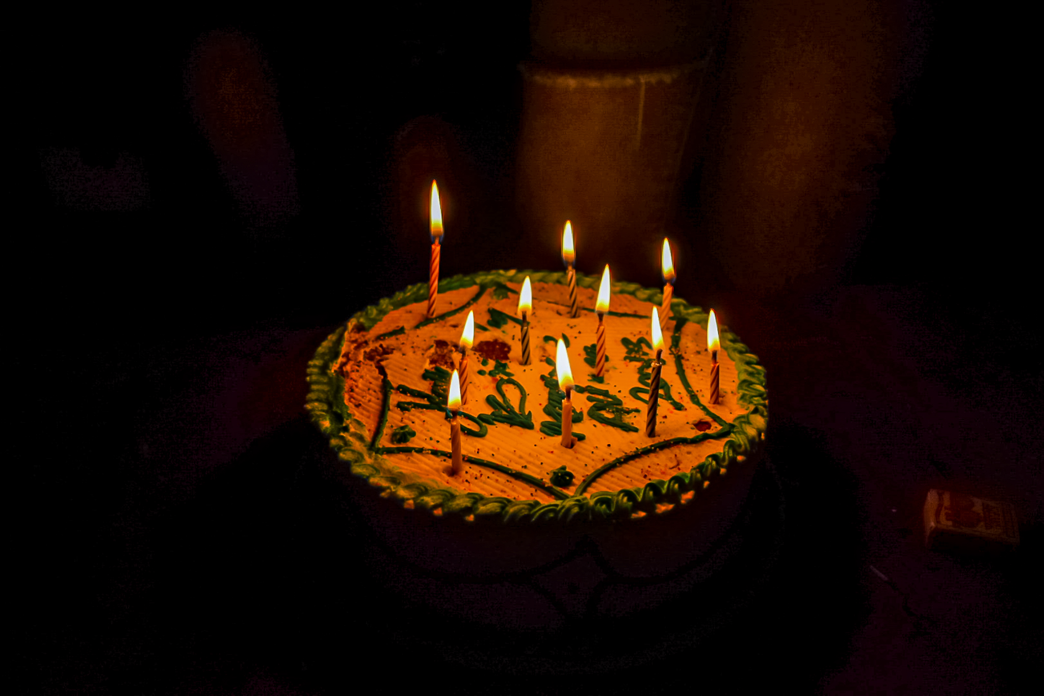 Birthday with lit candles