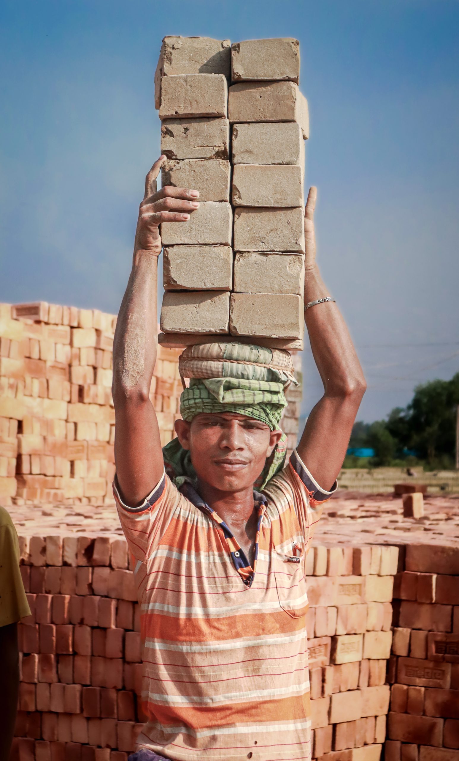 A worker is working in a brick kiln.