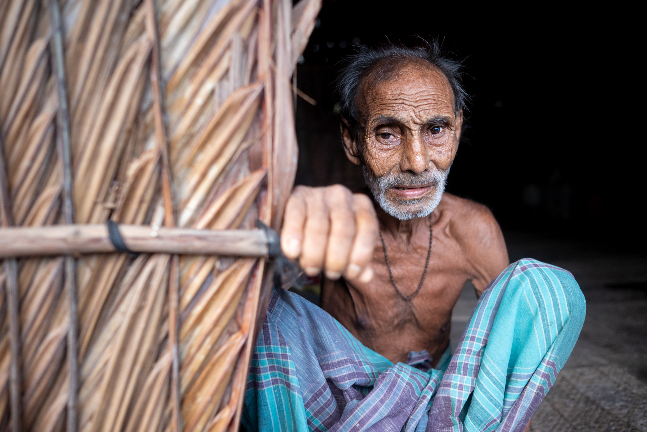 Portrait of old man in costal area