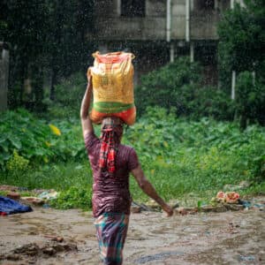 Burden Beneath the Rain