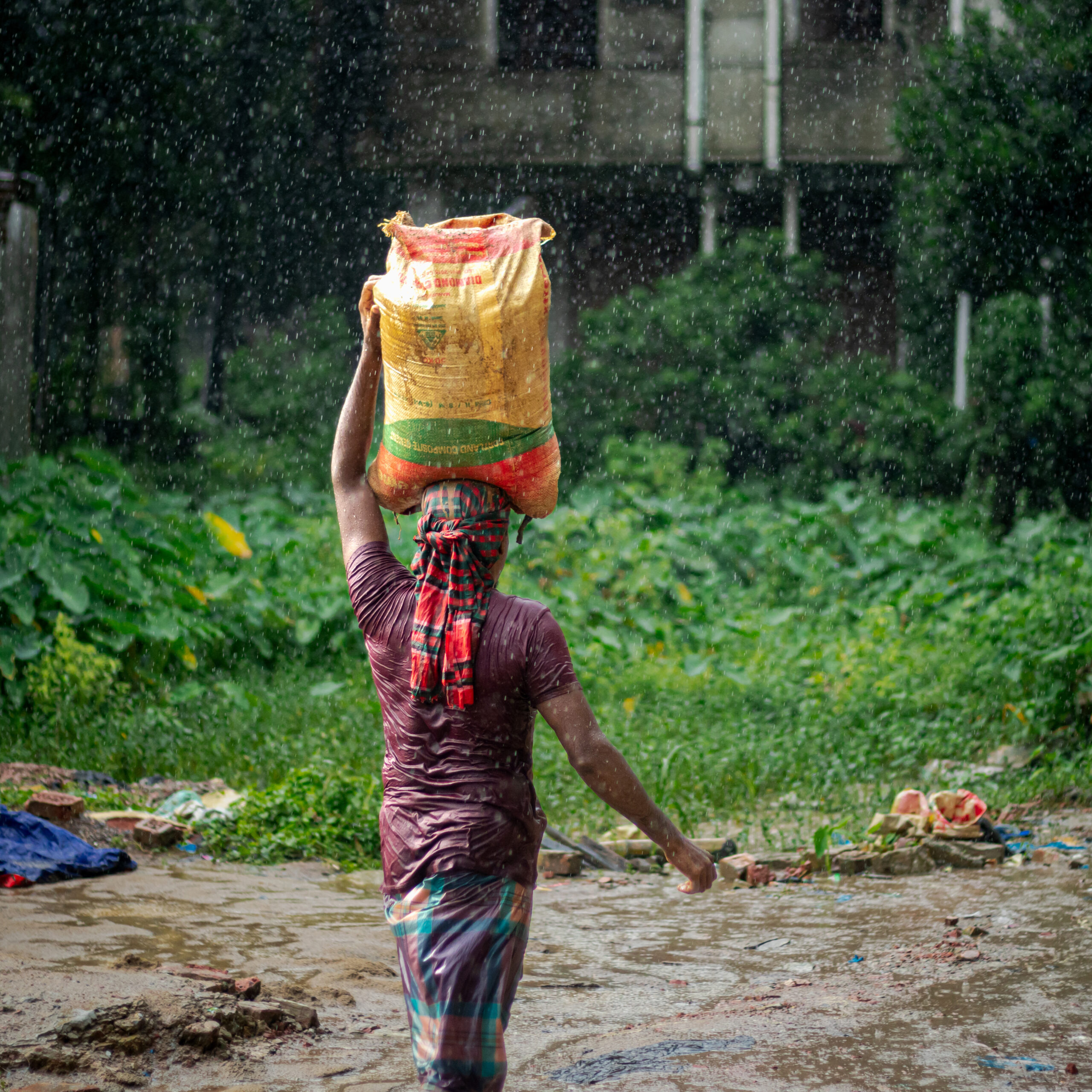 Burden Beneath the Rain