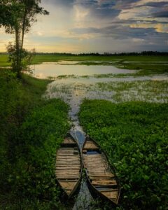 Sunset, river and boat