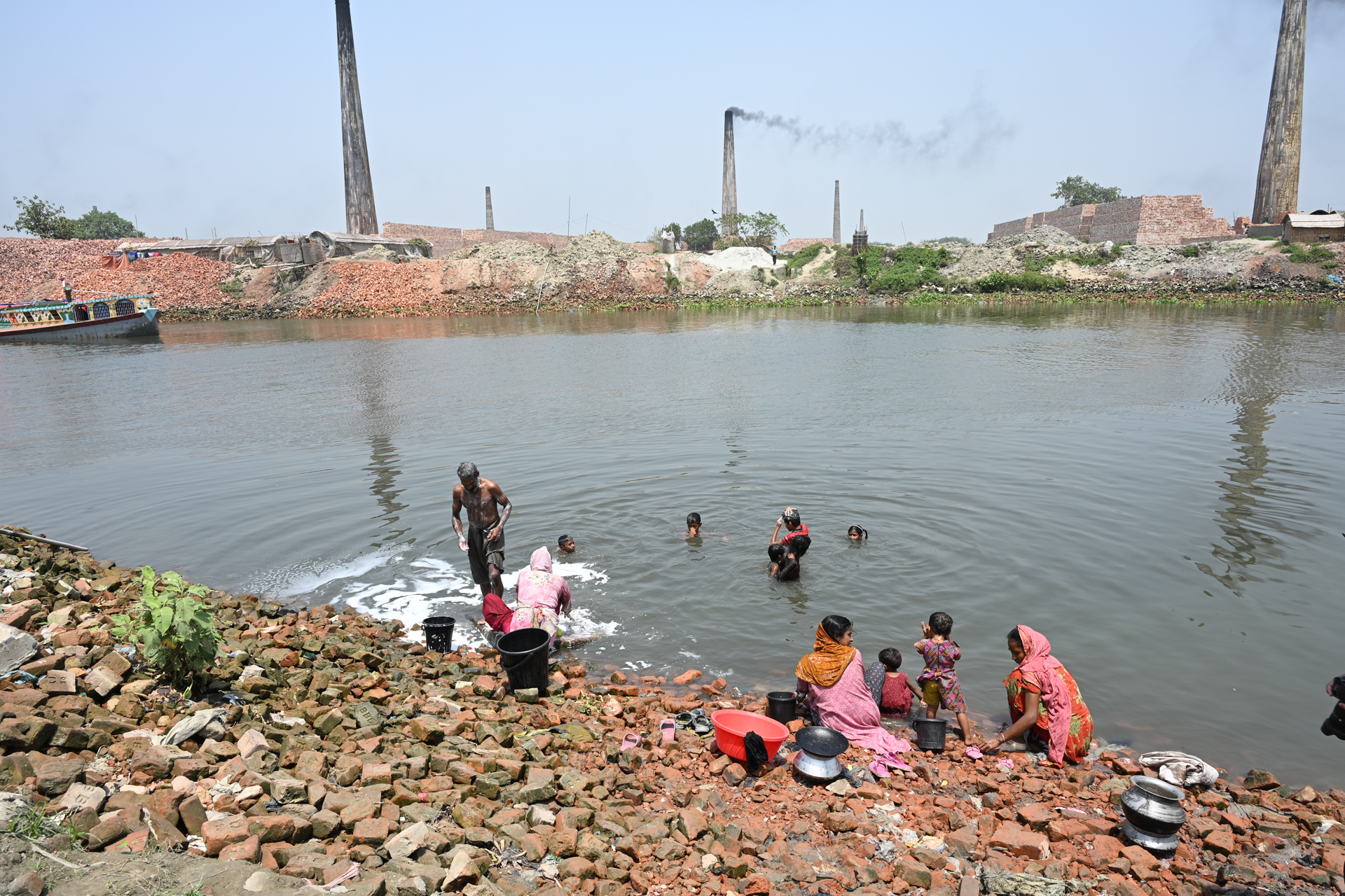 Bathing Beside Brick Kilns